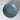 Ceramic plate with blue floral pattern on a marble surface