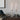 Orrefors Carat Brass Candlestick pair pictured with lit candles