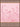 Le Jacquard Francais Blooming Pink Tea Towel. Towel has beautiful floral blooms against a pink background. The borders are an art nouveau scroll design.