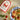 Valente Market fettuccine seasoning package with a bowl of pasta and shrimp on a textured surface