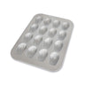 Metallic shell-shaped mold on a white background
