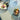 Two small dishes with food on a patterned tablecloth