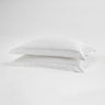 Two bed pillows with shams