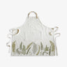 White apron with fern leaf pattern on a white background