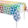 Colorful geometric patterned tablecloth on a white background