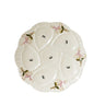 Cream colored scalloped oyster plate with flowers