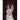 Greeting card with a rabbit's head featuring a pink flower and the text 'Thinking of You' on a dark background.