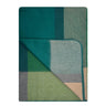 Folded plaid blanket with green and blue pattern on a white background